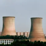 Cooling towers of a power plant are depicted.