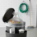 Stop garbage juice turning trash cans into maggot farms — AI-generated illustration