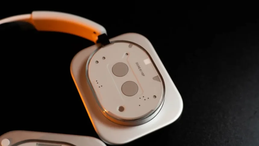 A medical device with a cable and two buttons.