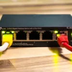 A network switch with ethernet cables connected.