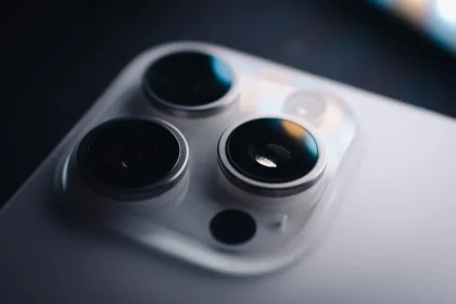 Close-up shows the triple-lens camera on a phone.