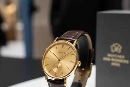 Nomos Tangente Gold Watch Signals Precious Metal Shift — AI-generated illustration