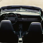 the dashboard of a car is shown from above