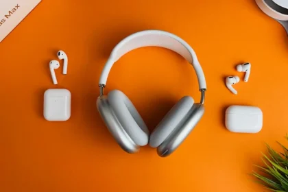 white and gray wireless headphones