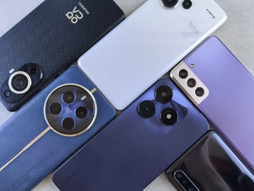 A bunch of cell phones sitting next to each other