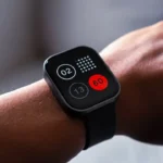 a close up of a person wearing a smart watch