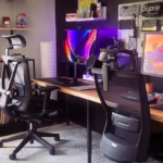 black office rolling chair beside brown wooden table