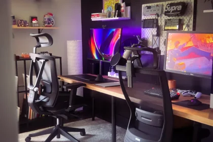 black office rolling chair beside brown wooden table