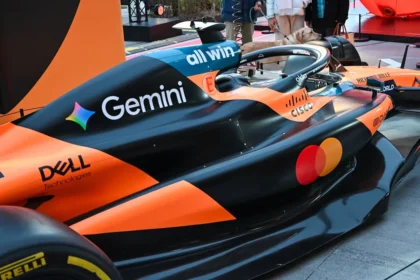 Mclaren formula 1 car with gemini and mastercard logos