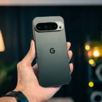 A person holding a cell phone in their hand