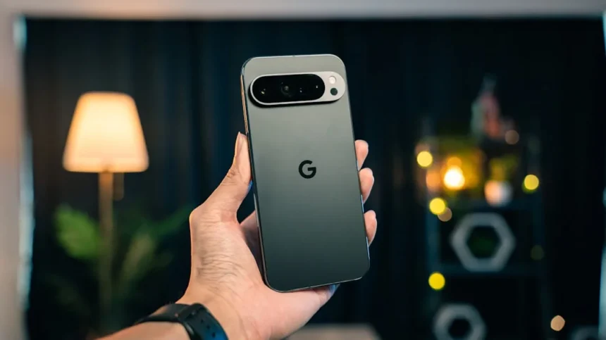 A person holding a cell phone in their hand