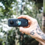 person holding black iphone 4