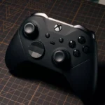 a close up of a controller on a table