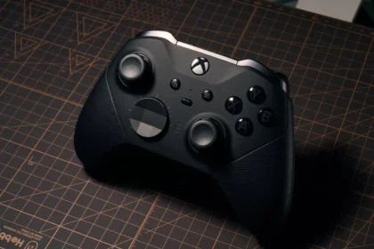 a close up of a controller on a table