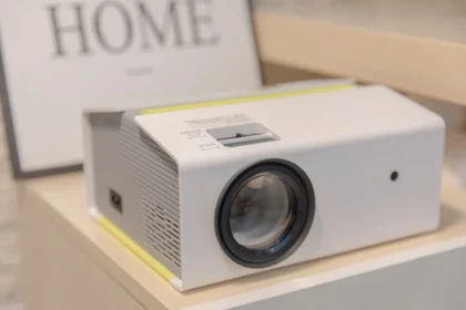 a white projector sitting on top of a table